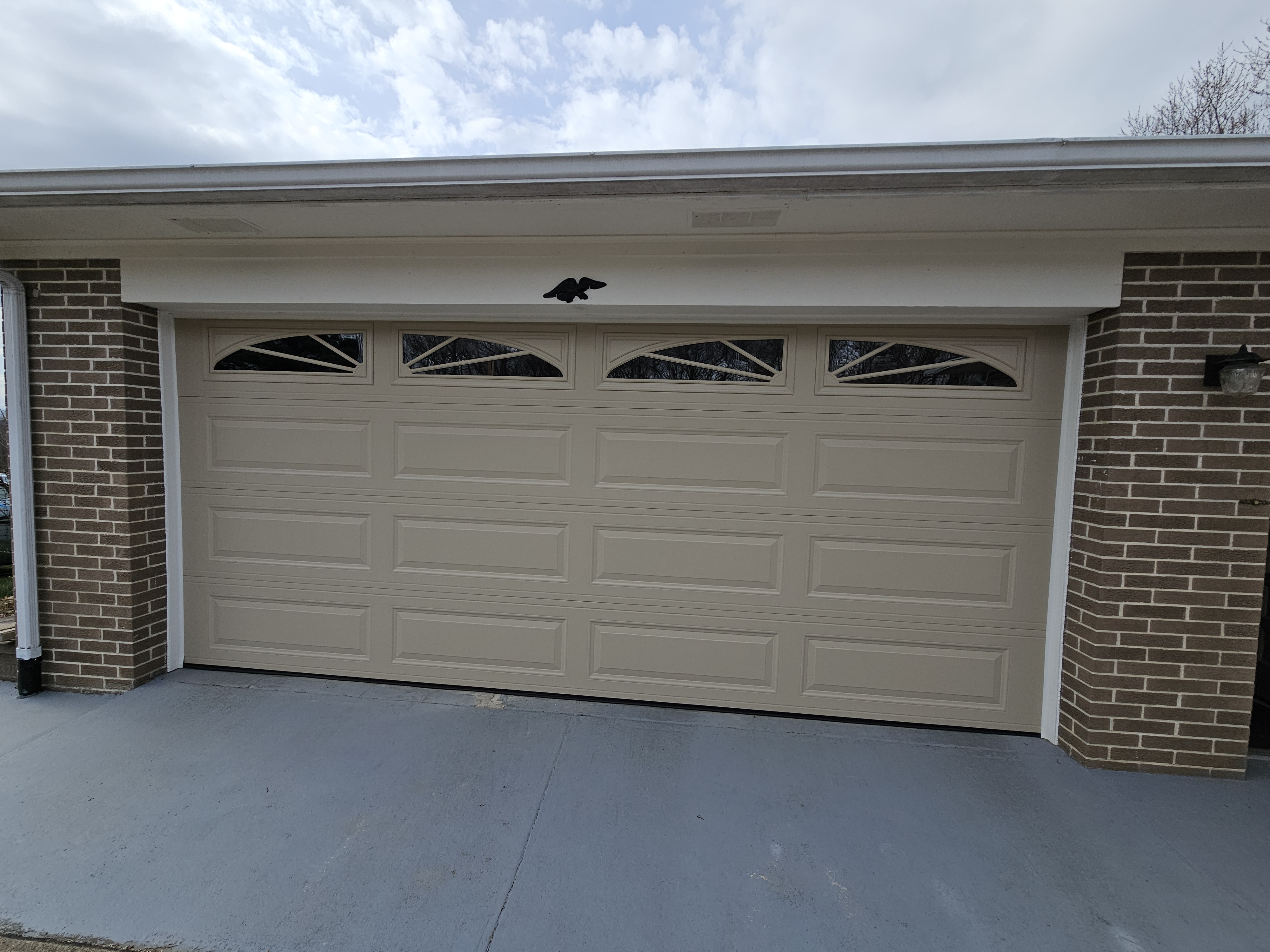 New garage door installs for happy clients