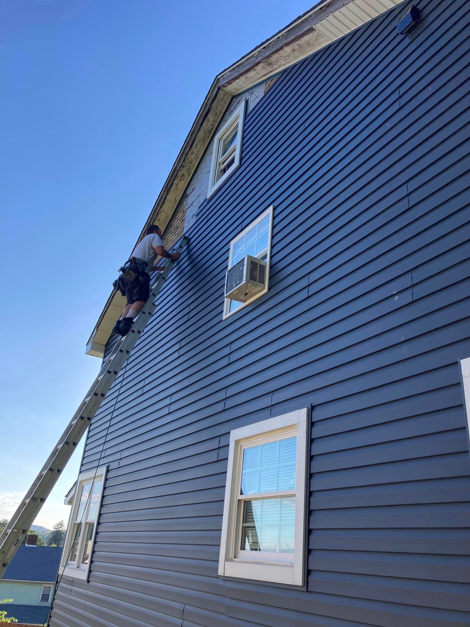 Vinyl siding repair and installations by BRM