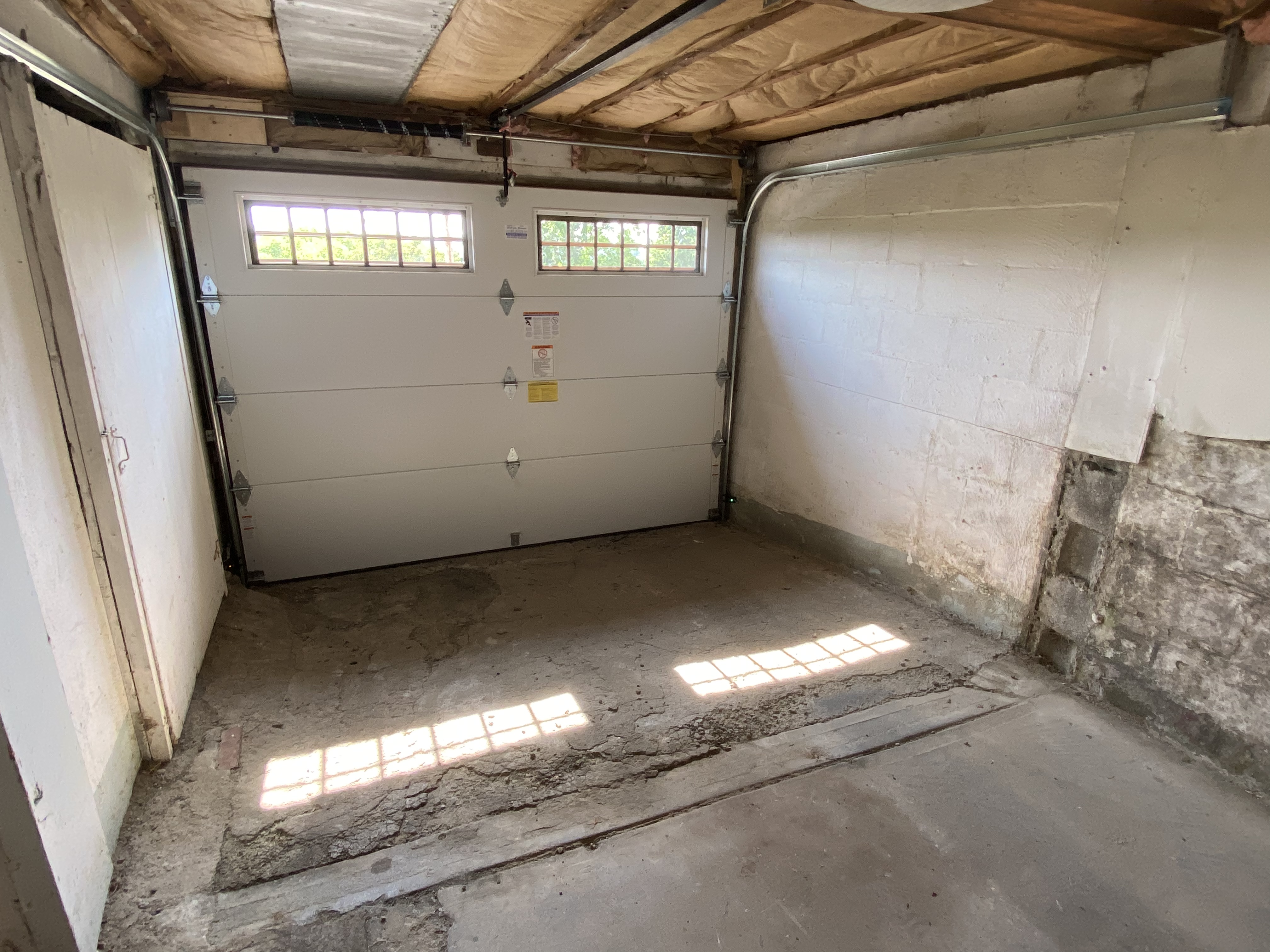 Garage door replacement with rotted door jamb repair