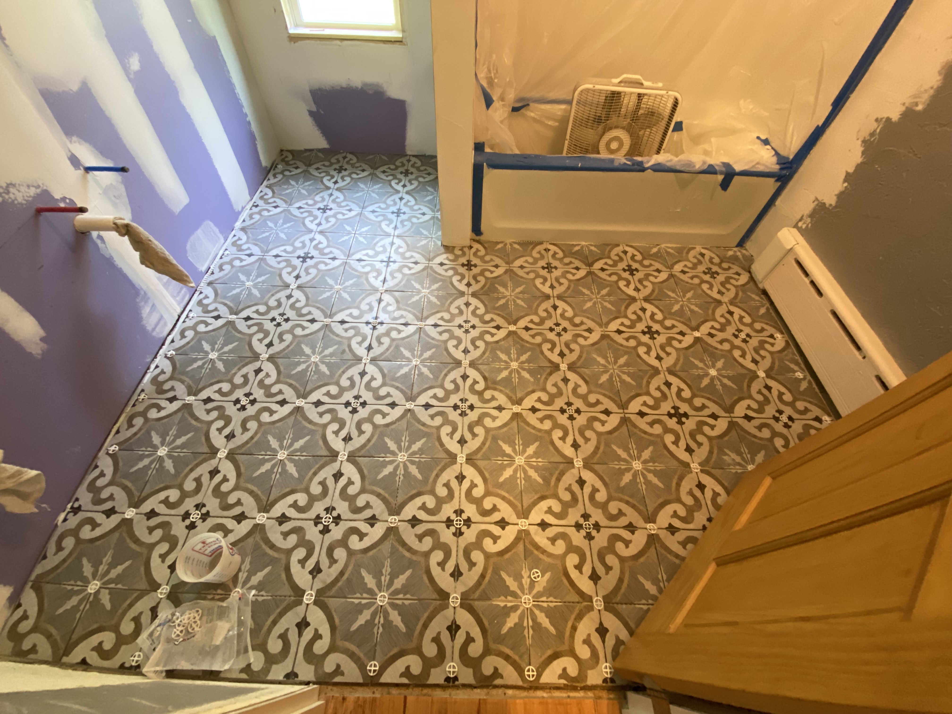 New ceramic tile floor install on this remodel project