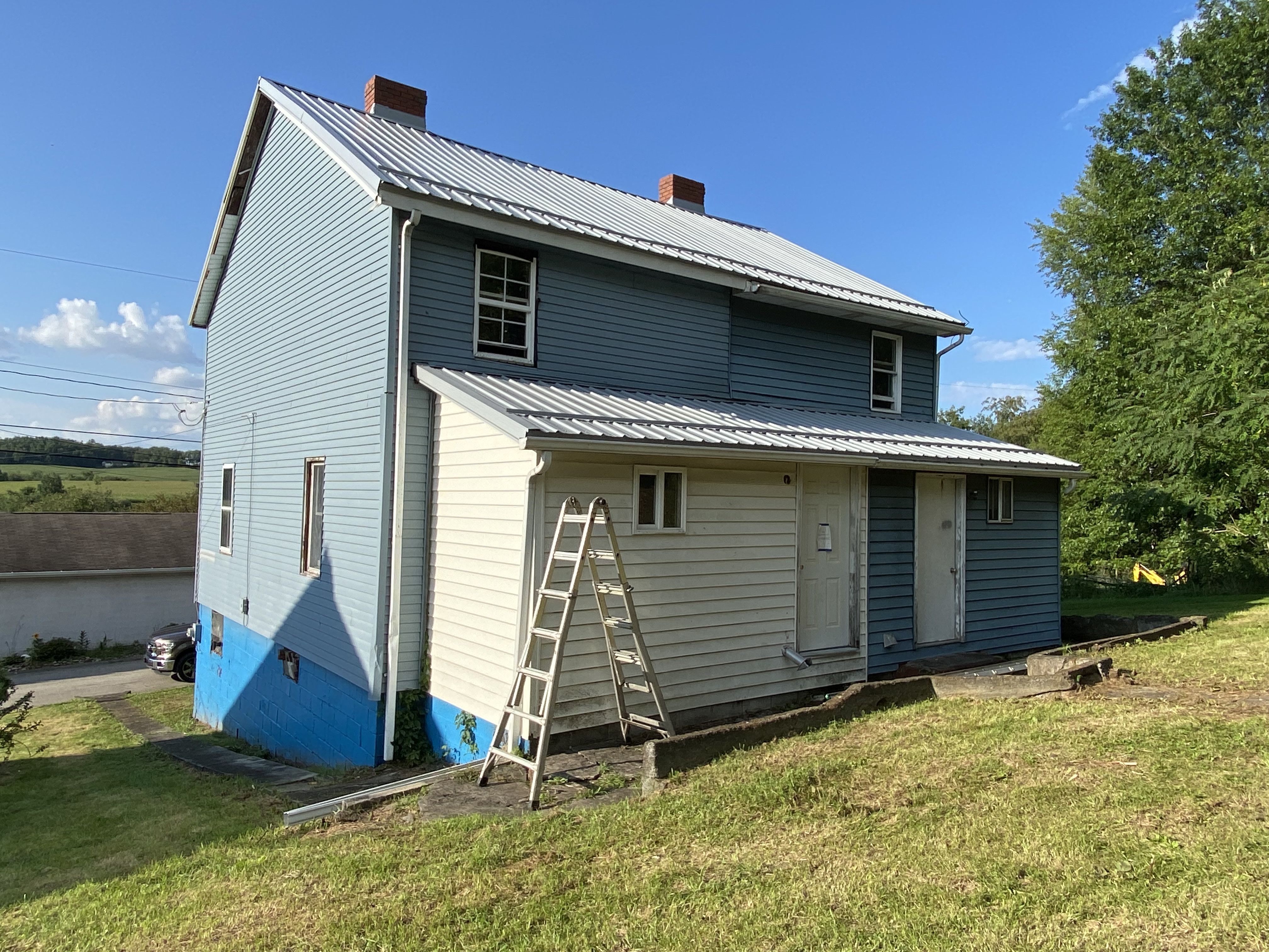 Metal roof install for this 2 story home